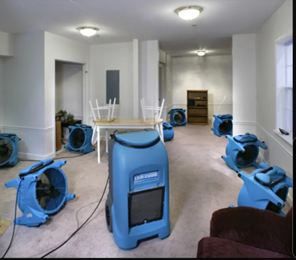 Air movers and dehumidifier setup for Water Damage Restoration in River Edge